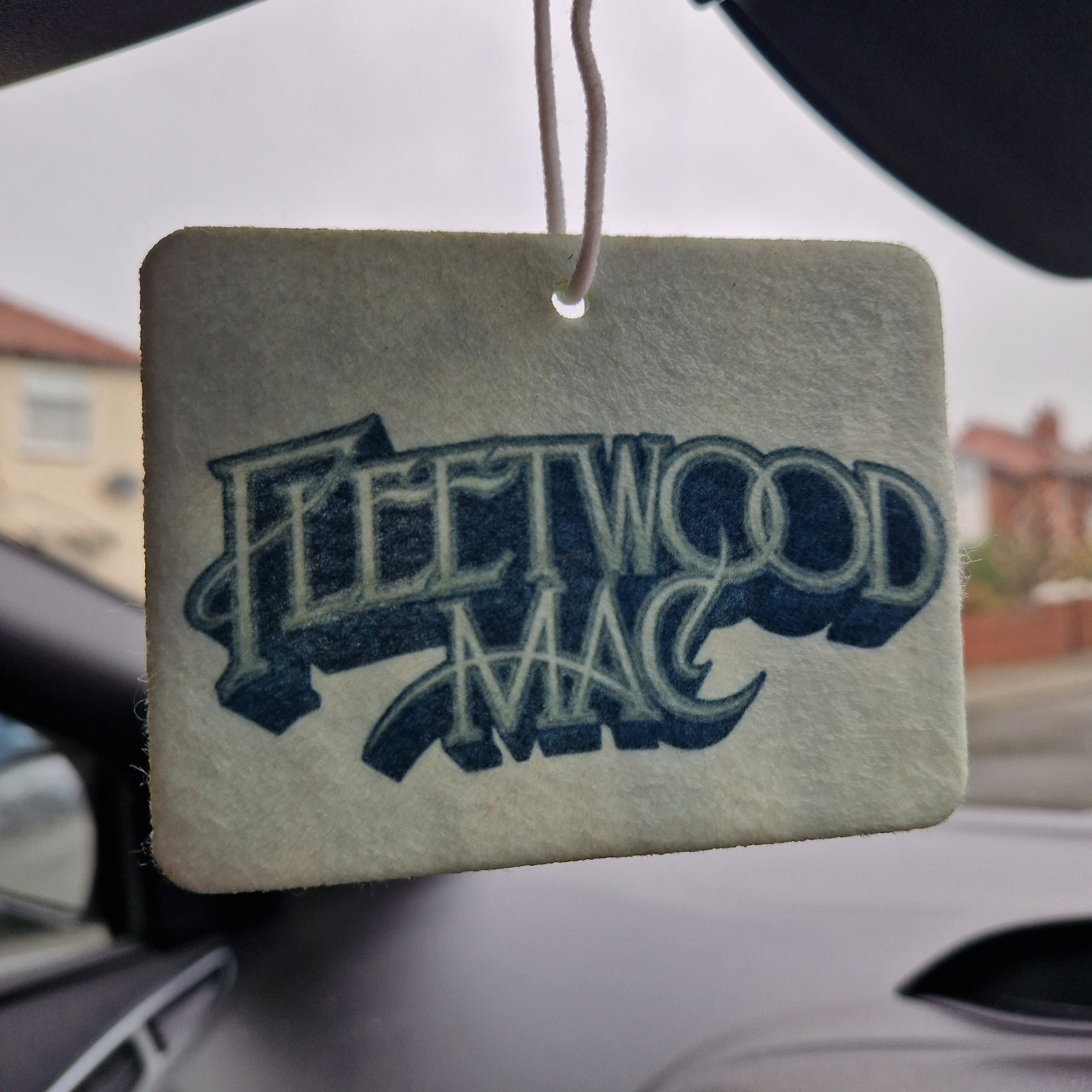 fleetwood mac logo on picture car air freshener hung in car greyscale music gift