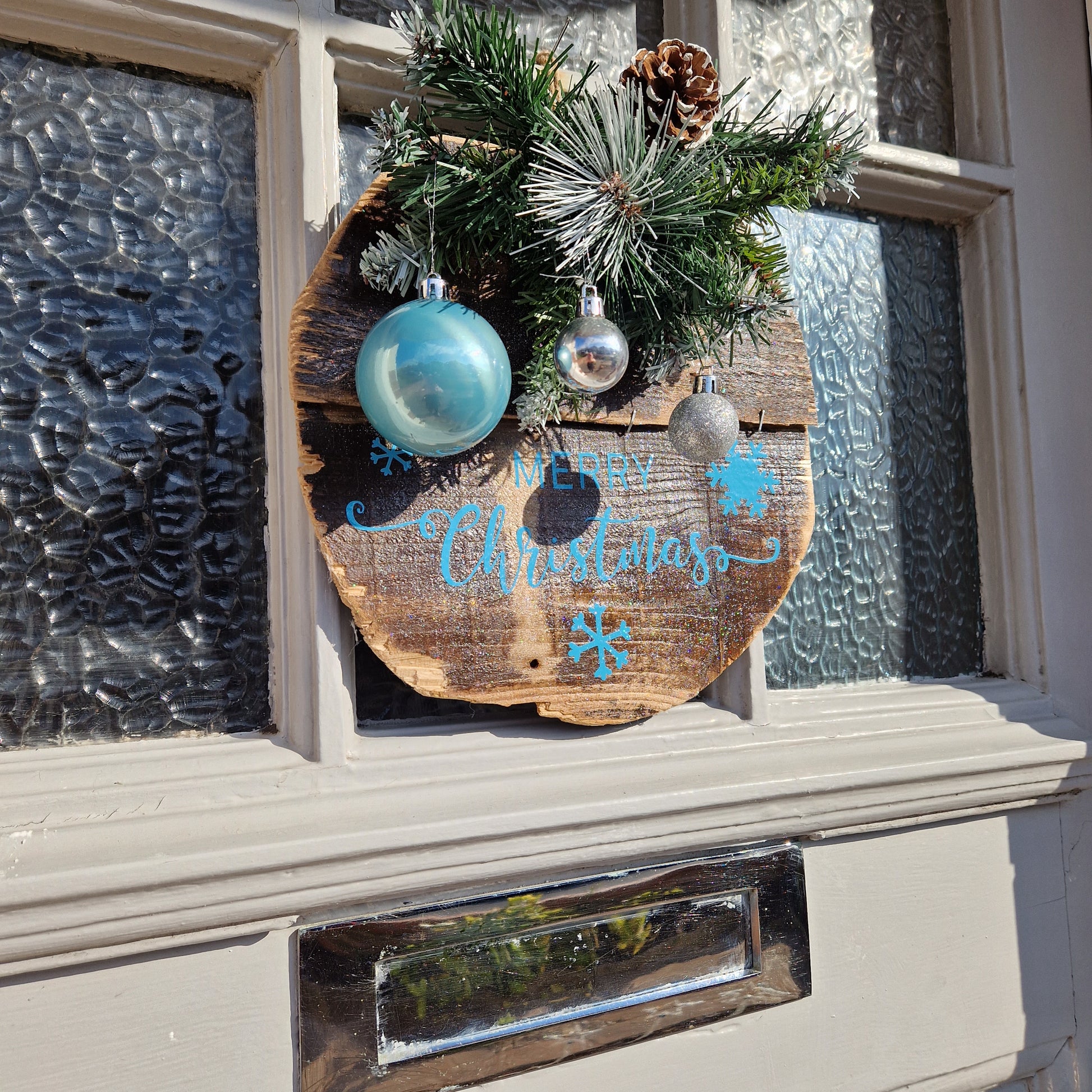 blue and silver christmas decoration wooden sign