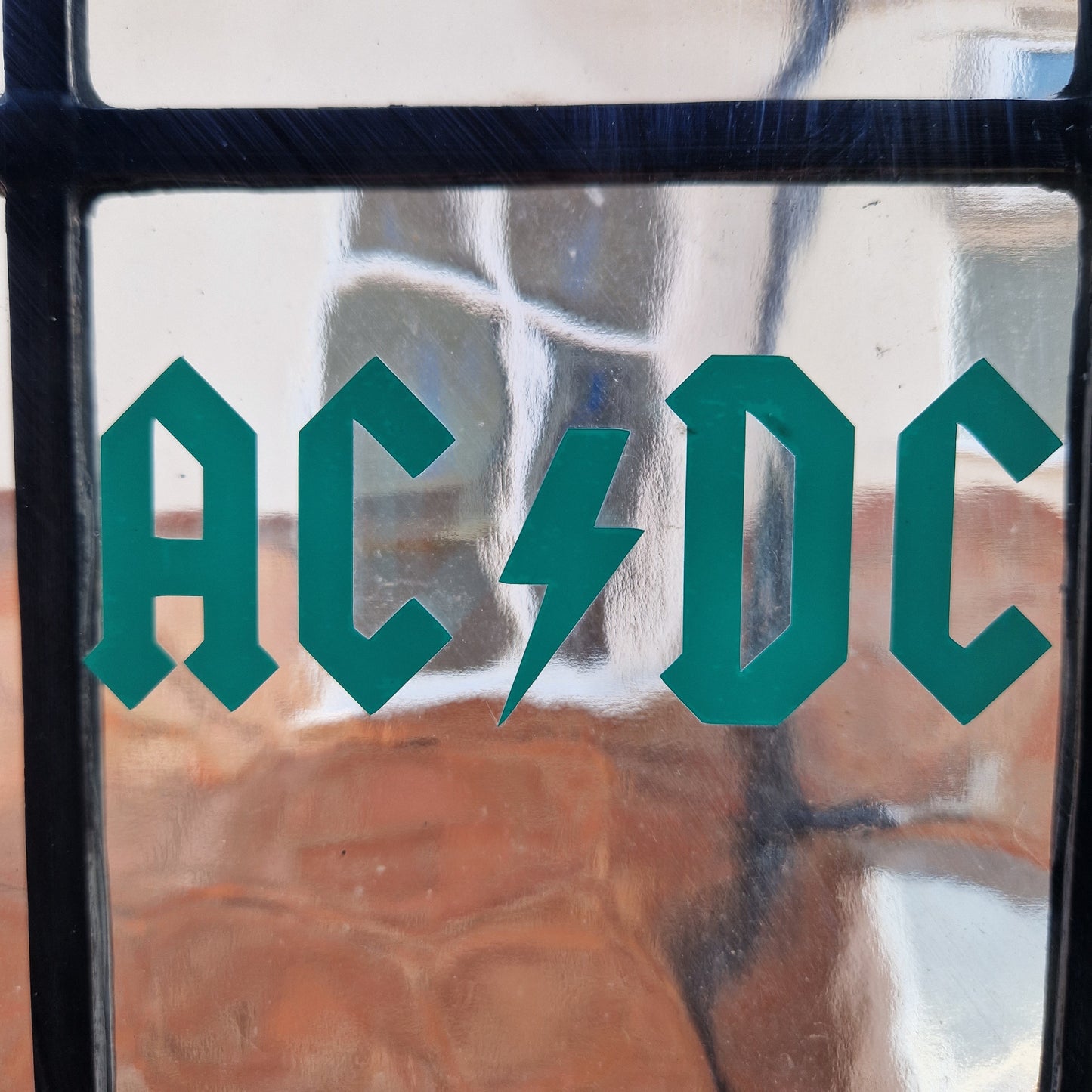 acdc sticker music decal on textured glass
