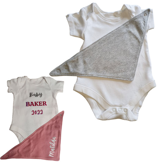personalised baby vest with holographic vinyl text example "baby baker 2022" on vest  "matilda" on bandana bib example.  Blank white vest with blank grey bib ready for print